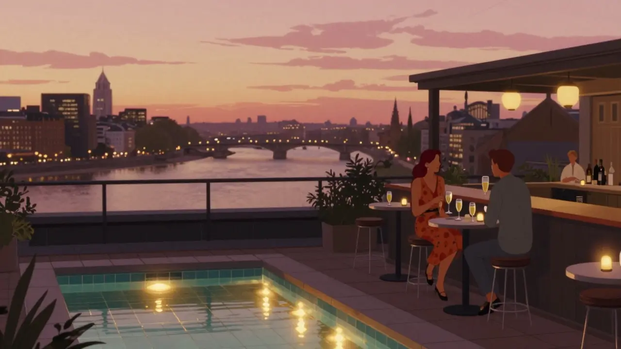 Rooftop bar in Brixton at sunset with tiled pool floor reflecting city lights and people drinking prosecco.